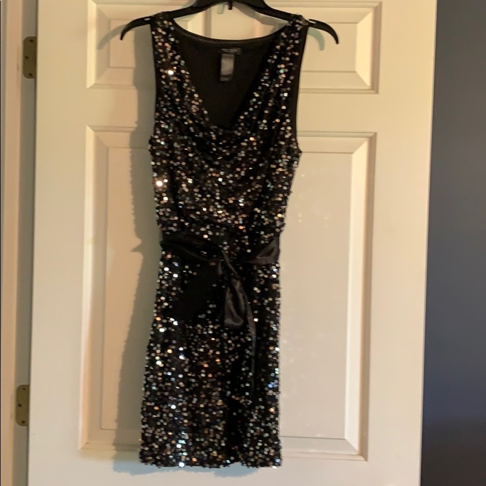 Sequin little black party dress.